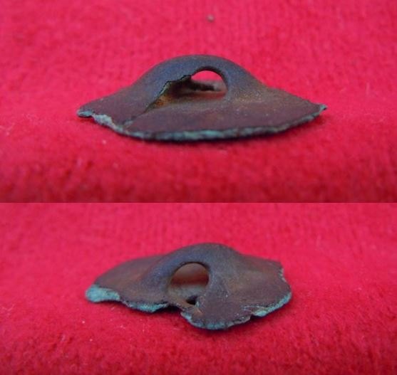 Bronzová puklička – nášivka (tutulus)